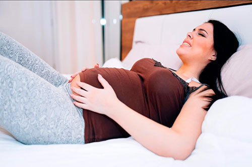 35 неделя беременности тянет поясницу и ноги thumbnail
