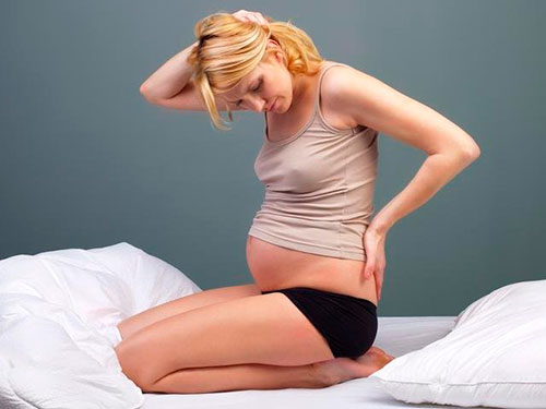 Болит в спине поясница при беременности на 3 триместре thumbnail